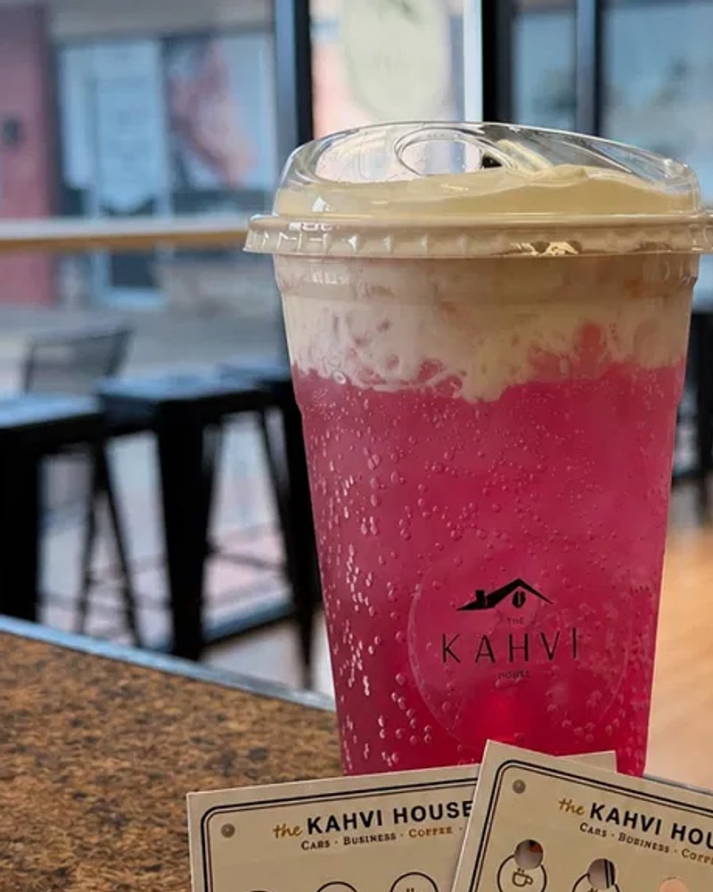 La Fresita — pink tiki energy drink with dragonfruit and cream, the most-ordered drink at the KAHVI House
